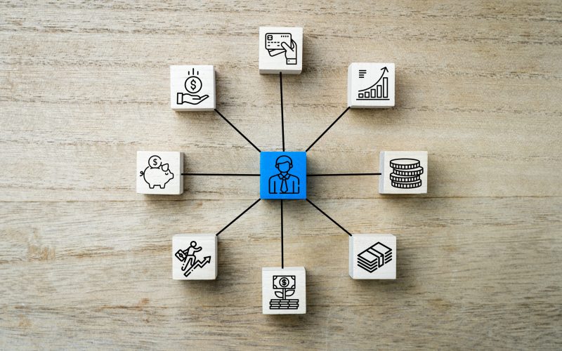 Personal money, finance and buisness icons or symbold on wooden square blocks